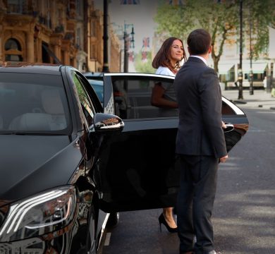 Luxury chauffeur car service arriving at music concert venue in Melbourne